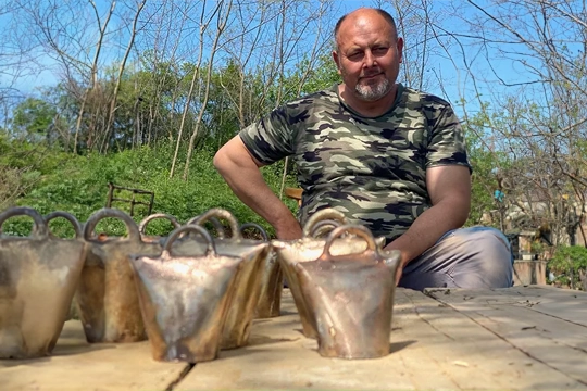 Casting bells at a Roma blacksmith